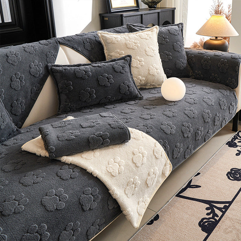 Sofaauflage aus Plüsch mit Pfotenrelief und Rutschhemmung