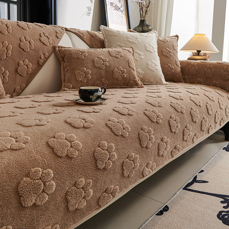 Sofaauflage aus Plüsch mit Pfotenrelief und Rutschhemmung