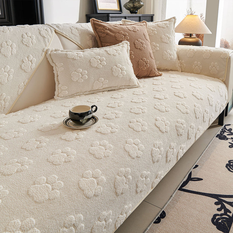 Sofaauflage aus Plüsch mit Pfotenrelief und Rutschhemmung