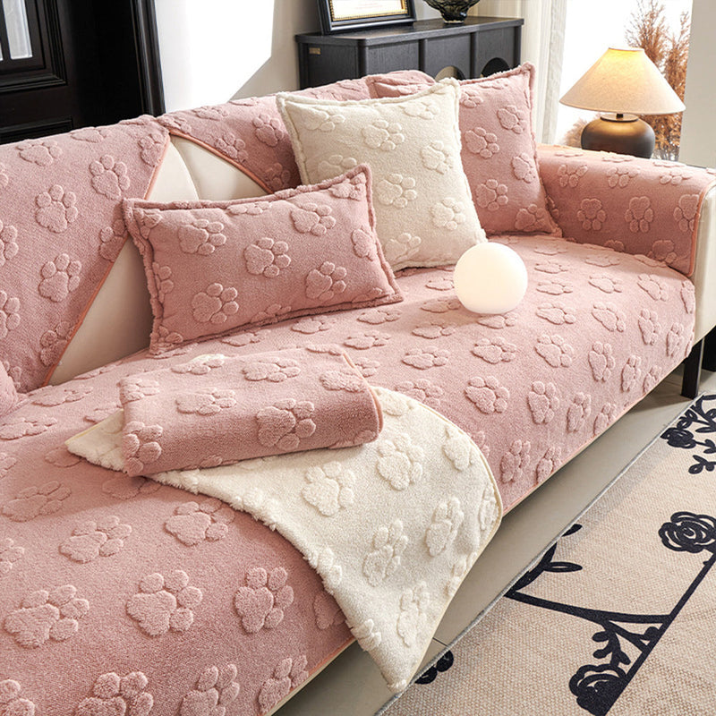 Sofaauflage aus Plüsch mit Pfotenrelief und Rutschhemmung