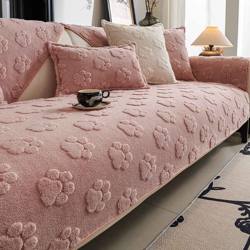 Sofaauflage aus Plüsch mit Pfotenrelief und Rutschhemmung